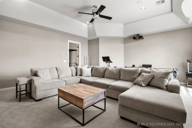 12014 S Kingston Pl, Tulsa, OK 74137 - carpeted living area with a ceiling fan, a raised ceiling, and ornamental molding