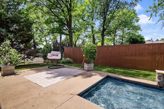 12014 S Kingston Pl, Tulsa, OK 74137 - view of swimming pool featuring a fenced backyard and a patio area