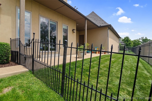 12014 S Kingston Pl, Tulsa, OK 74137 - view of side of property with stucco siding, a shingled roof, a patio, and a gate