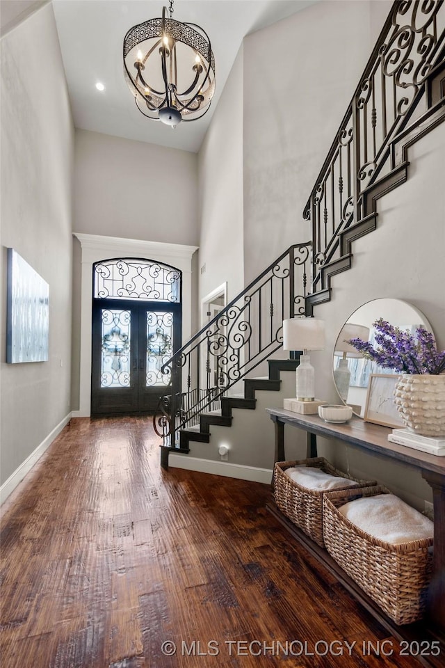 12014 S Kingston Pl, Tulsa, OK 74137 - foyer featuring a high ceiling, french doors, stairway, wood finished floors, and a chandelier
