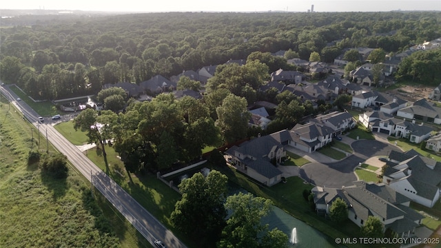 12014 S Kingston Pl, Tulsa, OK 74137 - aerial view of property and surrounding area with a forest and nearby suburban area