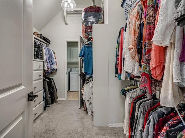 2915 E Rockford Pl, Broken Arrow, OK 74014 - walk in closet featuring washer and dryer, light carpet, and vaulted ceiling