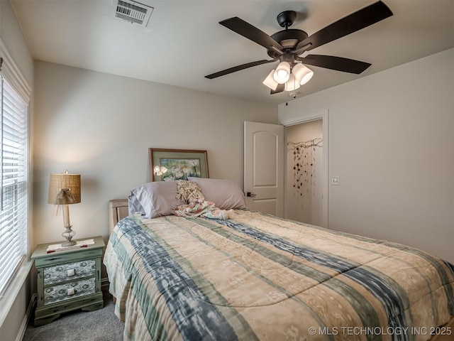 2915 E Rockford Pl, Broken Arrow, OK 74014 - carpeted bedroom with a ceiling fan