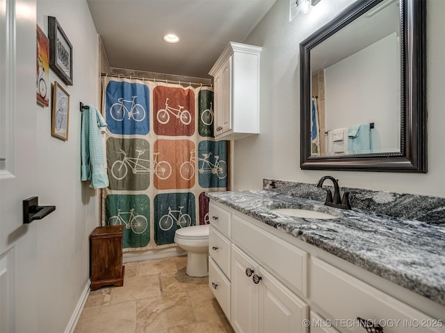 2915 E Rockford Pl, Broken Arrow, OK 74014 - full bath with vanity, toilet, stone finish flooring, recessed lighting, and baseboards