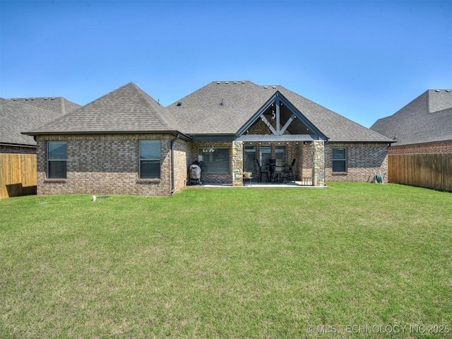 2915 E Rockford Pl, Broken Arrow, OK 74014 - back of property with brick siding, roof with shingles, and a patio area