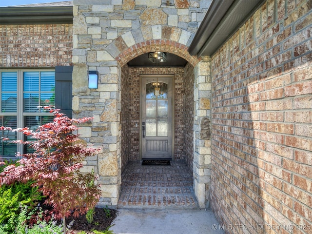 2915 E Rockford Pl, Broken Arrow, OK 74014 - entrance to property featuring stone siding and brick siding