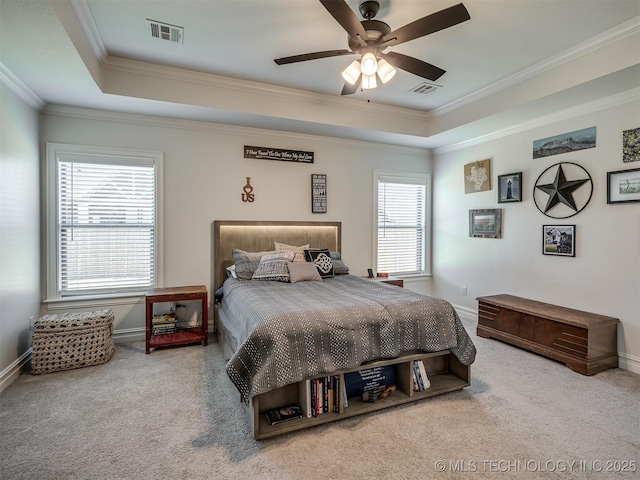 2915 E Rockford Pl, Broken Arrow, OK 74014 - bedroom with carpet, a tray ceiling, ornamental molding, baseboards, and ceiling fan