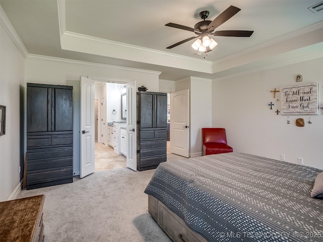 2915 E Rockford Pl, Broken Arrow, OK 74014 - bedroom with a tray ceiling, crown molding, light colored carpet, a ceiling fan, and ensuite bathroom