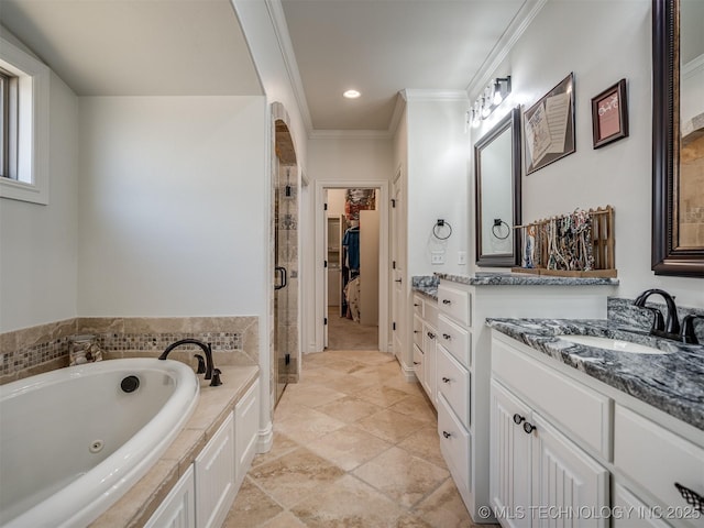 2915 E Rockford Pl, Broken Arrow, OK 74014 - bathroom featuring a stall shower, vanity, ornamental molding, a tub with jets, and a walk in closet