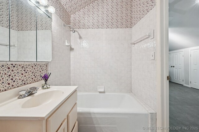 3898 E 72nd St, Tulsa, OK 74136 - bathroom with vanity and bathing tub / shower combination