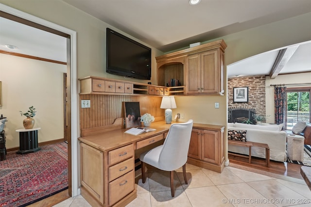3898 E 72nd St, Tulsa, OK 74136 - home office featuring built in desk, beam ceiling, and light tile patterned floors