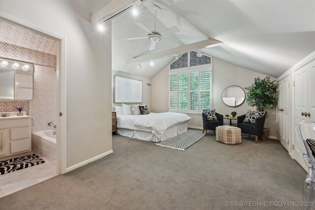 3898 E 72nd St, Tulsa, OK 74136 - carpeted bedroom featuring baseboards, ensuite bathroom, rail lighting, and a ceiling fan
