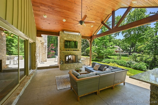 3898 E 72nd St, Tulsa, OK 74136 - view of patio / terrace with an outdoor living space with a fireplace and ceiling fan