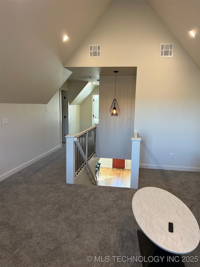 56648 Bloomer Rd, Afton, OK 74331 - additional living space with lofted ceiling, carpet flooring, and baseboards