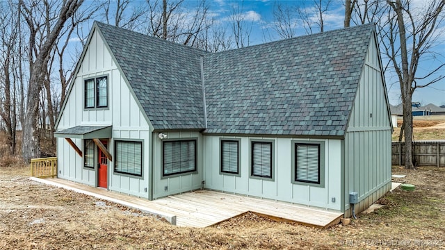 56648 Bloomer Rd, Afton, OK 74331 - view of front facade featuring a shingled roof, board and batten siding, and a wooden deck