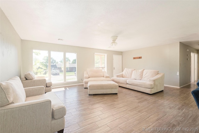 2207 Hillcrest Ct, Durant, OK 74701 - living area with light wood-style flooring and baseboards