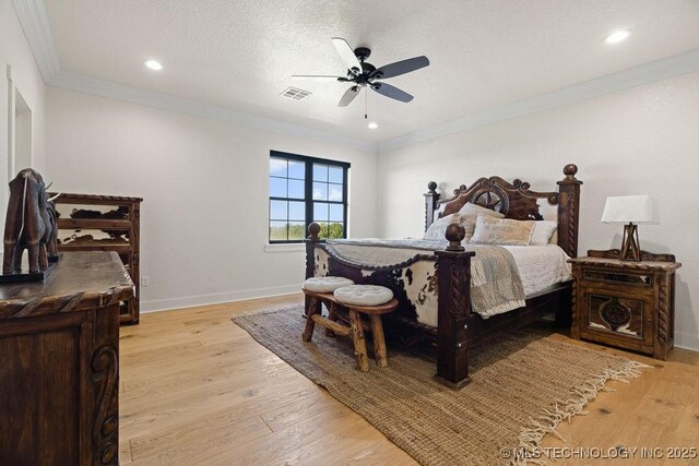 589 Three Mile Rd, Durant, OK 74701 - bedroom featuring light wood-type flooring, ornamental molding, baseboards, a ceiling fan, and recessed lighting