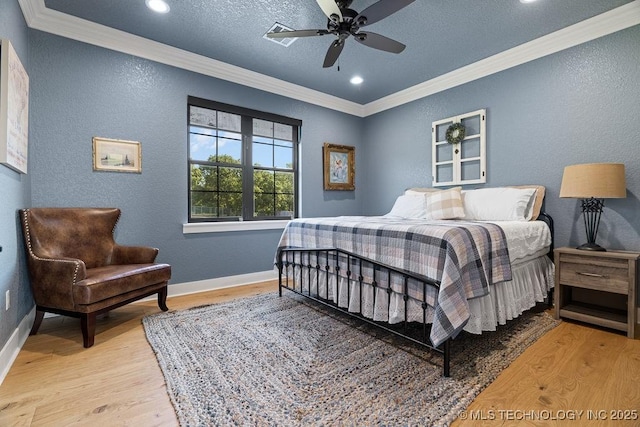589 Three Mile Rd, Durant, OK 74701 - bedroom with ornamental molding, a textured wall, wood finished floors, baseboards, and recessed lighting