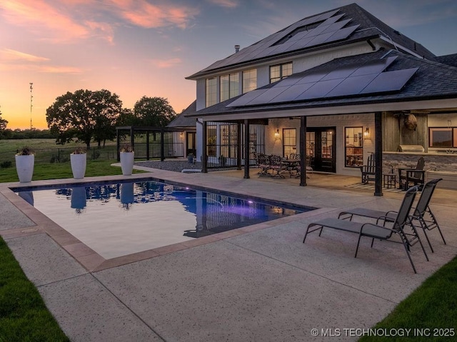 589 Three Mile Rd, Durant, OK 74701 - view of swimming pool featuring a patio, french doors, and a ceiling fan