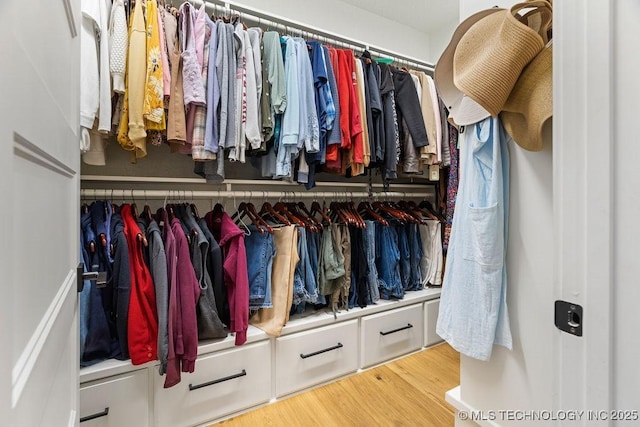 589 Three Mile Rd, Durant, OK 74701 - spacious closet featuring wood finished floors