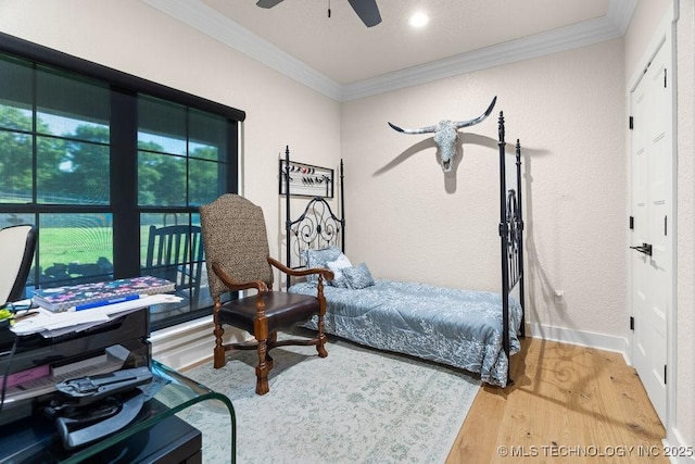 589 Three Mile Rd, Durant, OK 74701 - bedroom with ornamental molding, wood finished floors, a desk, baseboards, and ceiling fan