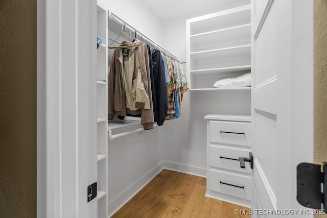 589 Three Mile Rd, Durant, OK 74701 - spacious closet with wood finished floors