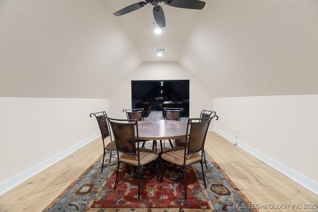 589 Three Mile Rd, Durant, OK 74701 - dining area with wood finished floors, lofted ceiling, ceiling fan, and baseboards