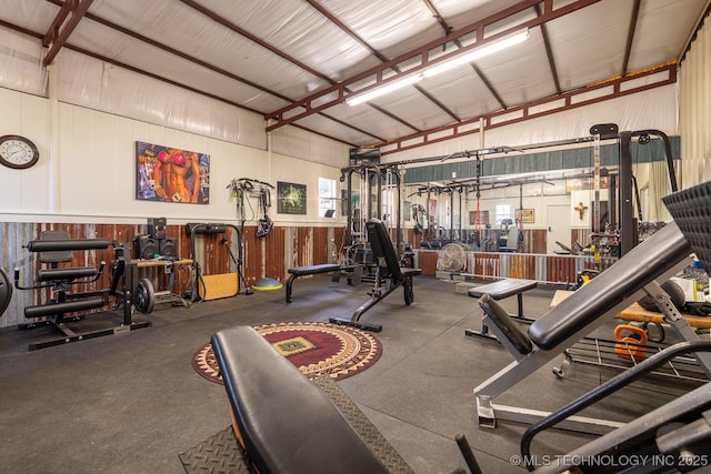 589 Three Mile Rd, Durant, OK 74701 - exercise room with a garage, vaulted ceiling, and metal wall