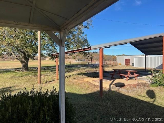 376 Lotoroc Ranch Rd, Barnsdall, OK 74002 - view of grassy yard featuring a carport