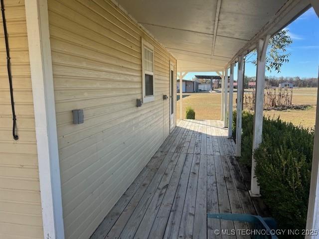 376 Lotoroc Ranch Rd, Barnsdall, OK 74002 - view of wooden porch