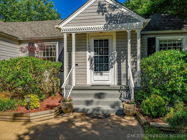1626 S Dewey Ave, Bartlesville, OK 74003 - entrance to property featuring roof with shingles
