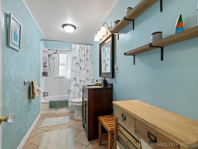 1626 S Dewey Ave, Bartlesville, OK 74003 - bathroom with vanity, toilet, shower / tub combo with curtain, tile patterned flooring, and baseboards