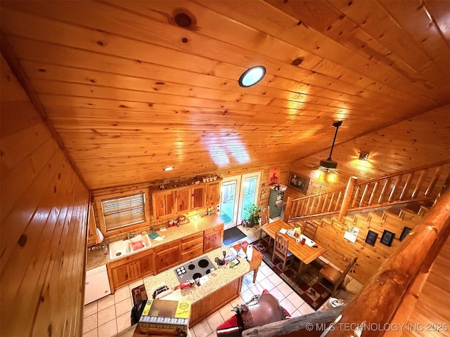7905 Hornbeam Rd, Henryetta, OK 74437 - living room featuring wooden ceiling, wood walls, light tile patterned floors, lofted ceiling, and ceiling fan