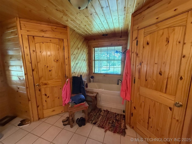 7905 Hornbeam Rd, Henryetta, OK 74437 - bathroom with a garden tub, tile patterned floors, wooden ceiling, and wooden walls