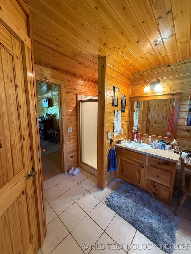 7905 Hornbeam Rd, Henryetta, OK 74437 - bathroom with tile patterned flooring, vanity, wood walls, a shower stall, and wood ceiling
