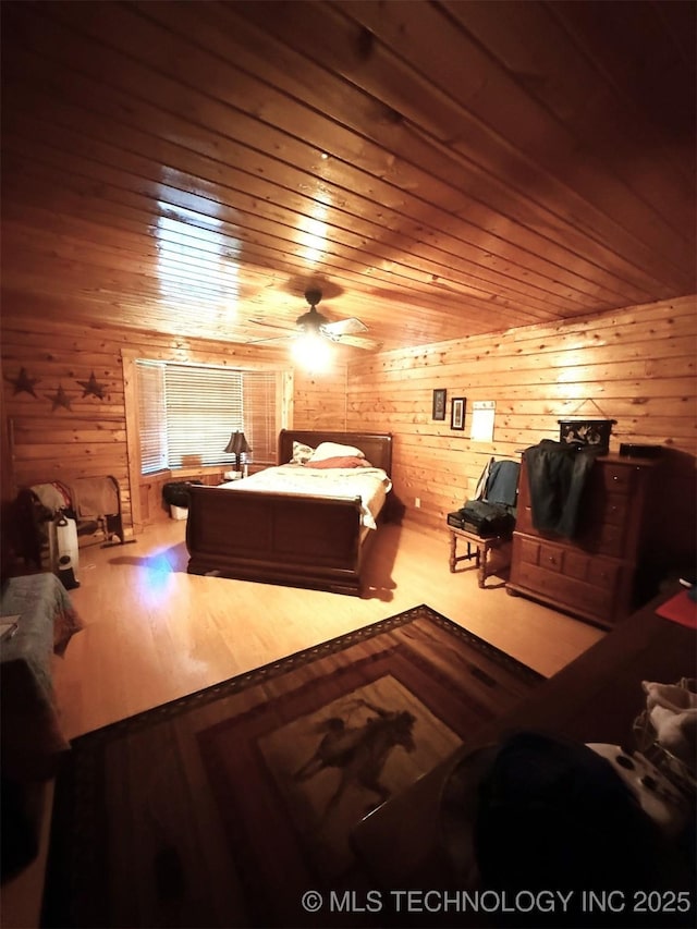 7905 Hornbeam Rd, Henryetta, OK 74437 - bedroom featuring wooden walls and wood ceiling