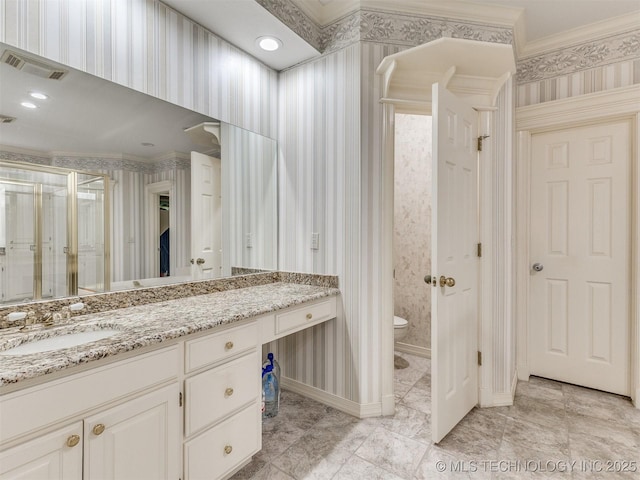 609 E Pensacola St, Broken Arrow, OK 74011 - full bath with vanity, ornamental molding, toilet, and wallpapered walls