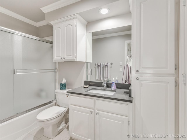 609 E Pensacola St, Broken Arrow, OK 74011 - full bath featuring vanity, ornamental molding, toilet, shower / bath combination with glass door, and tile patterned flooring
