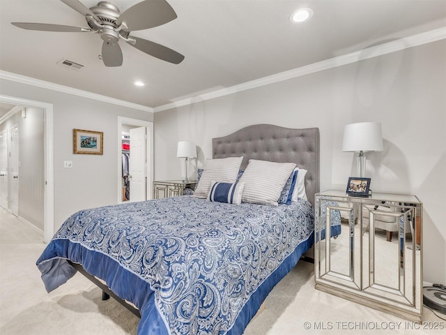 609 E Pensacola St, Broken Arrow, OK 74011 - carpeted bedroom with crown molding, recessed lighting, a walk in closet, ceiling fan, and baseboards