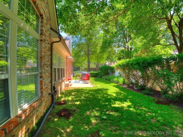 609 E Pensacola St, Broken Arrow, OK 74011 - view of yard with a patio area
