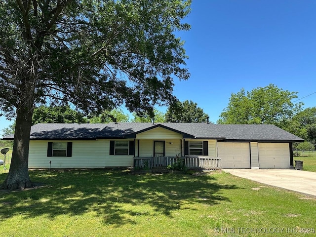 109948 S 4155th Rd, Checotah, OK 74426 - single story home featuring a garage, driveway, a porch, and a front lawn