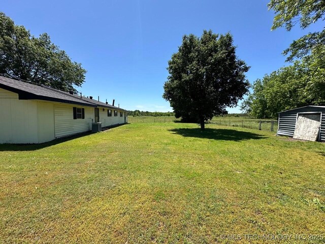 109948 S 4155th Rd, Checotah, OK 74426 - view of yard with central AC