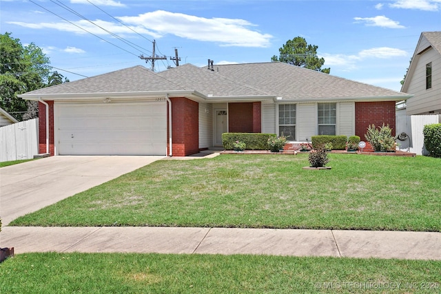 12013 E 27th St, Tulsa, OK 74129 - ranch-style home with brick siding, a garage, driveway, and roof with shingles