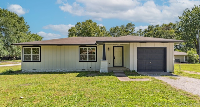 201 W 9th St, Claremore, OK 74017 - ranch-style house with driveway, a front yard, and a garage
