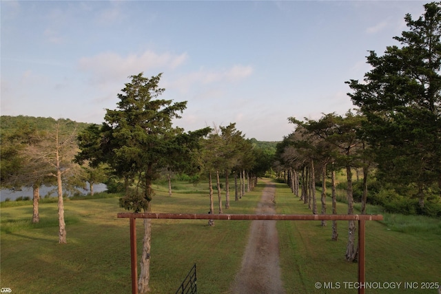 1965 Mcalester Lk, Mcalester, OK 74501 - surrounding community featuring a yard