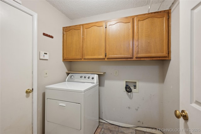 10511 S 83rd Cir, Tulsa, OK 74133 - laundry area with washer / dryer, cabinet space, and a textured ceiling
