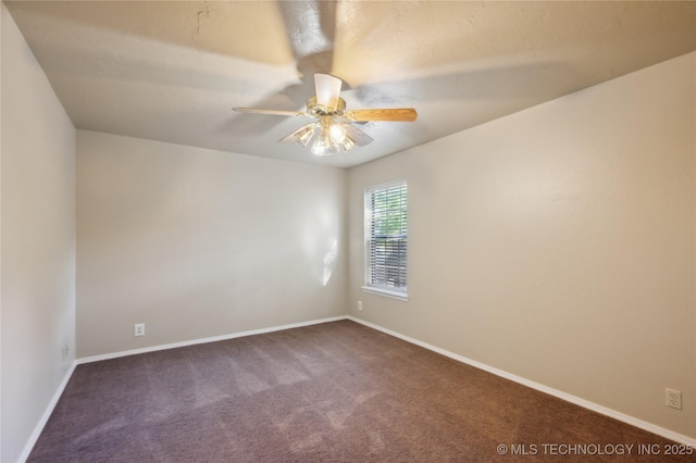 10511 S 83rd Cir, Tulsa, OK 74133 - spare room with ceiling fan, dark colored carpet, and baseboards