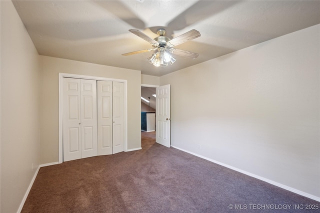 10511 S 83rd Cir, Tulsa, OK 74133 - unfurnished bedroom featuring carpet flooring, a closet, baseboards, and a ceiling fan
