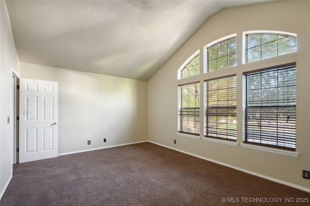 10511 S 83rd Cir, Tulsa, OK 74133 - additional living space featuring dark carpet, vaulted ceiling, and baseboards