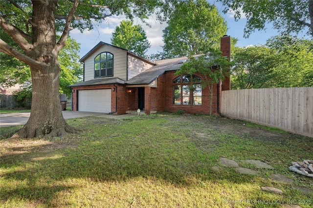 10511 S 83rd Cir, Tulsa, OK 74133 - traditional-style house featuring an attached garage, brick siding, a chimney, and driveway